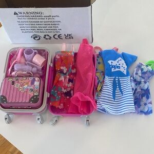 Barbie Travel Playset with Pink Suitcase Accessories and Dresses